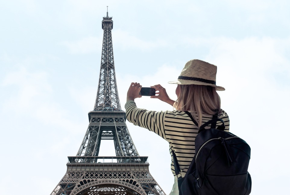 student near the Eiffel Tower